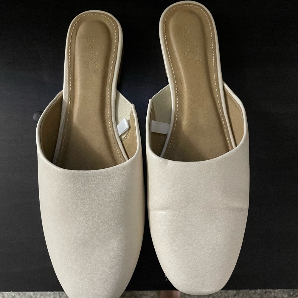 Beige slip on shoes